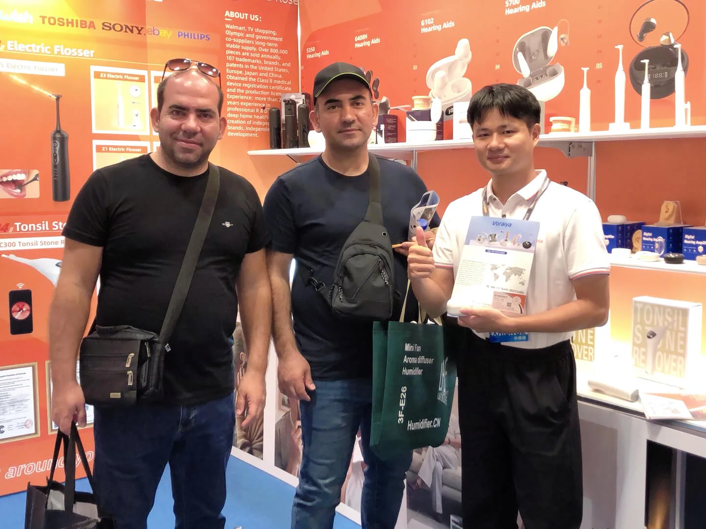Gold Rose discussing products with buyers at a Hong Kong exhibition